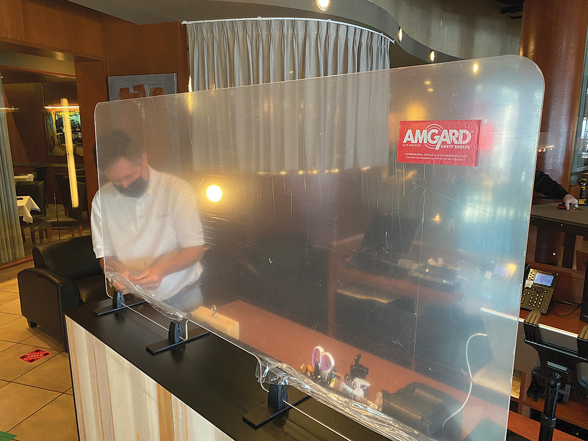 AMGARD™ safety shields being installed in Cameron Mitchell Restaurants