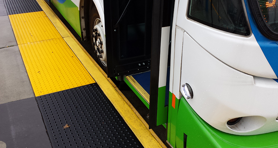 Polyslick® Bus Curb protecting the curb and the bus at traditional street-level stops
