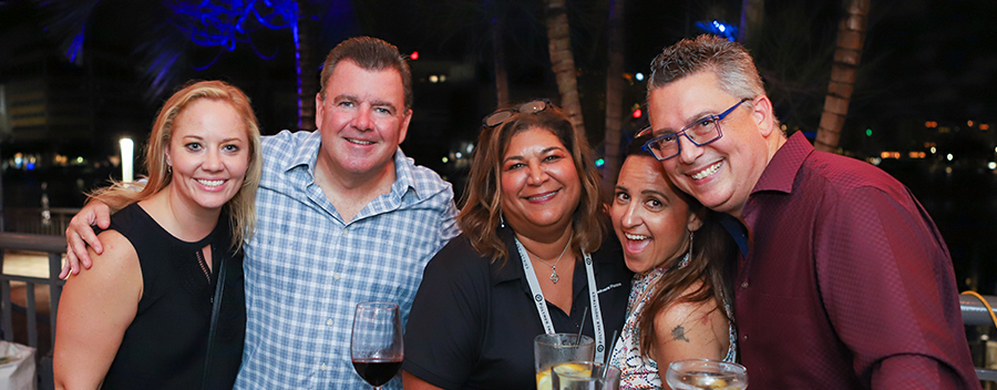 people posing for a photo at a fun social event