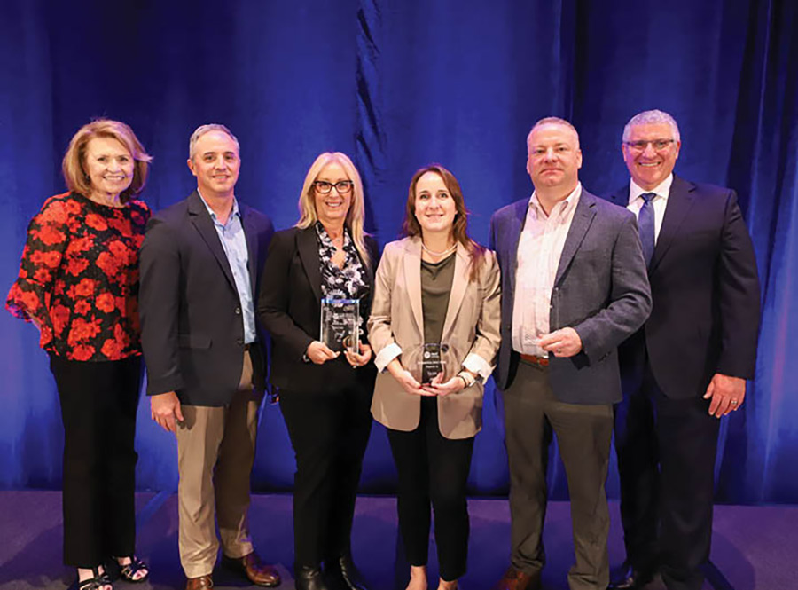 A Gold Level Environmental Excellence Award was presented to Kevin Duffy, Lisa Kreinces, Amanda Winters and Kevin Vincent of Vycom.