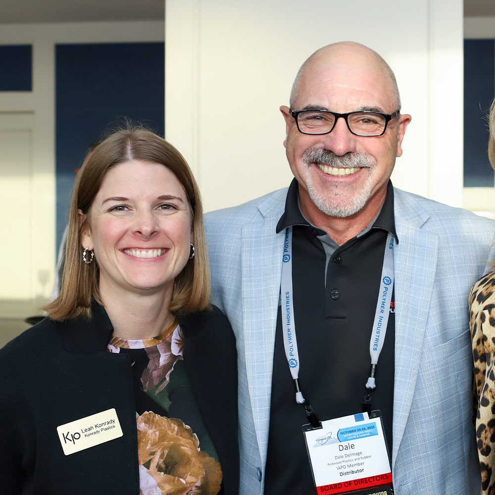 two attendees pictured at a Plastics PAC Fundraiser