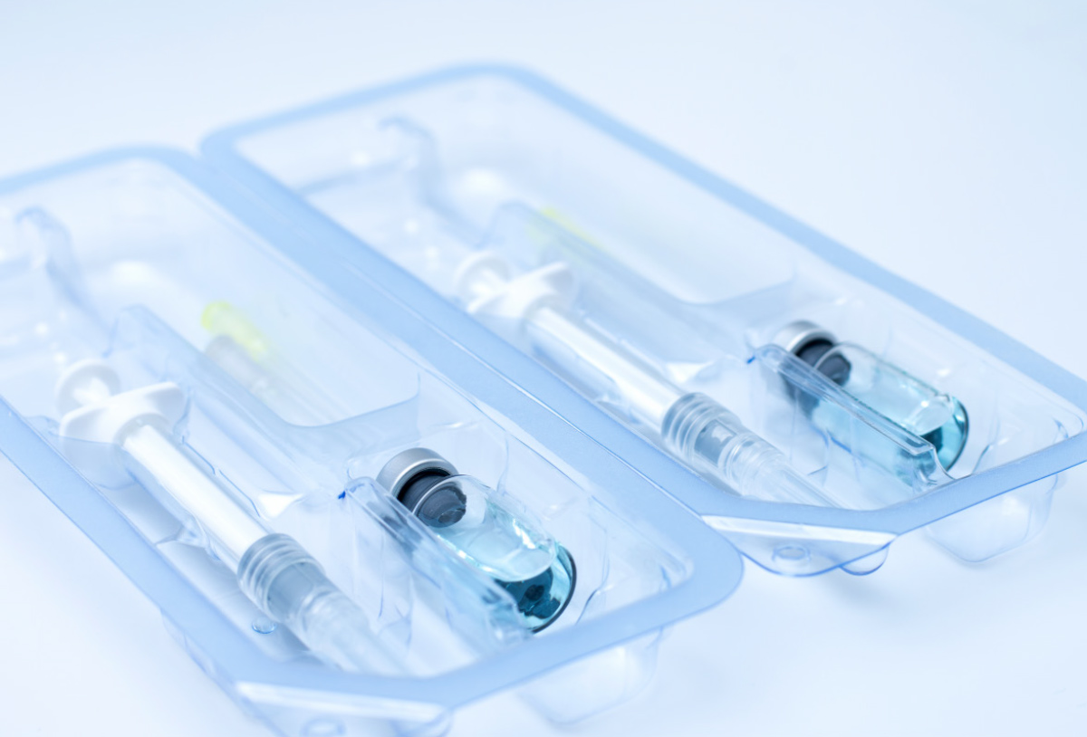 two packs of syringes and vials