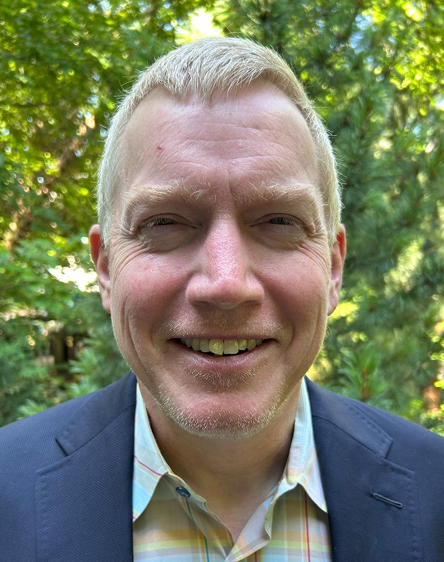 headshot of William Slade